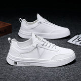 Sneakers basse uomo effetto pelle con lacci