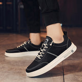 Sneakers basse uomo effetto pelle con lacci
