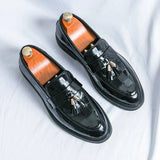 Mocassini uomo con nappine in vernice lucida