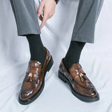 Mocassini uomo con nappine in vernice lucida