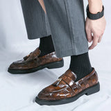 Mocassini uomo con nappine in vernice lucida
