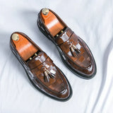 Mocassini uomo con nappine in vernice lucida